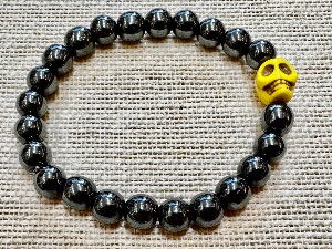 Hematite 8mm Beads with 10mm Magnesite Skull Bead - 19cm Elasticated Bracelet  (ref SHMB122865)